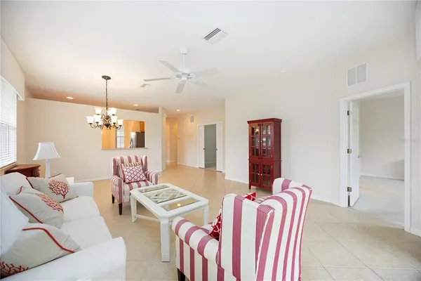 a living room with furniture and window