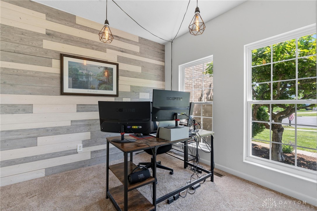 70 Martin Lane Springboro, OH 45066 - Photo 25 of 69 This versatile office space features captivating accent walls, offering a dynamic and productive environment.
