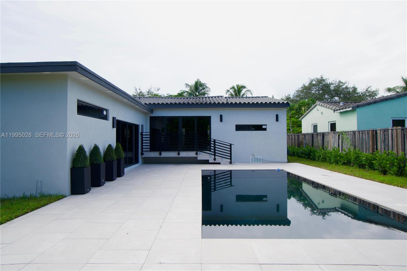 2155 Southwest 25th Terrace Miami, FL 33133 - Photo 5 of 13 a view of a house with backyard and sitting area