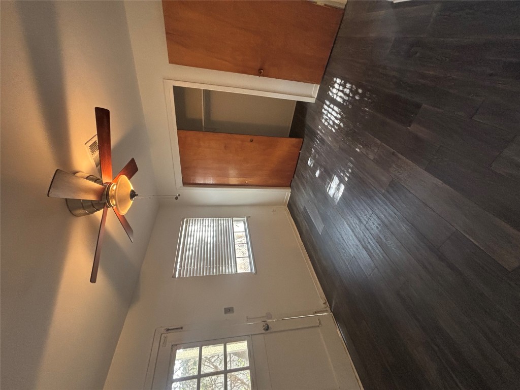 2324 Hartford Road Austin, TX 78703 - Photo 13 of 20 a view of an empty room with window and wooden floor