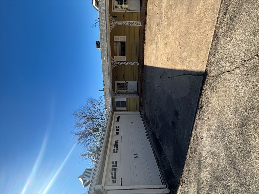 2324 Hartford Road Austin, TX 78703 - Photo 2 of 20 a view of a house with a large parking space