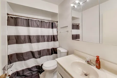 a bathroom with a sink and a toilet