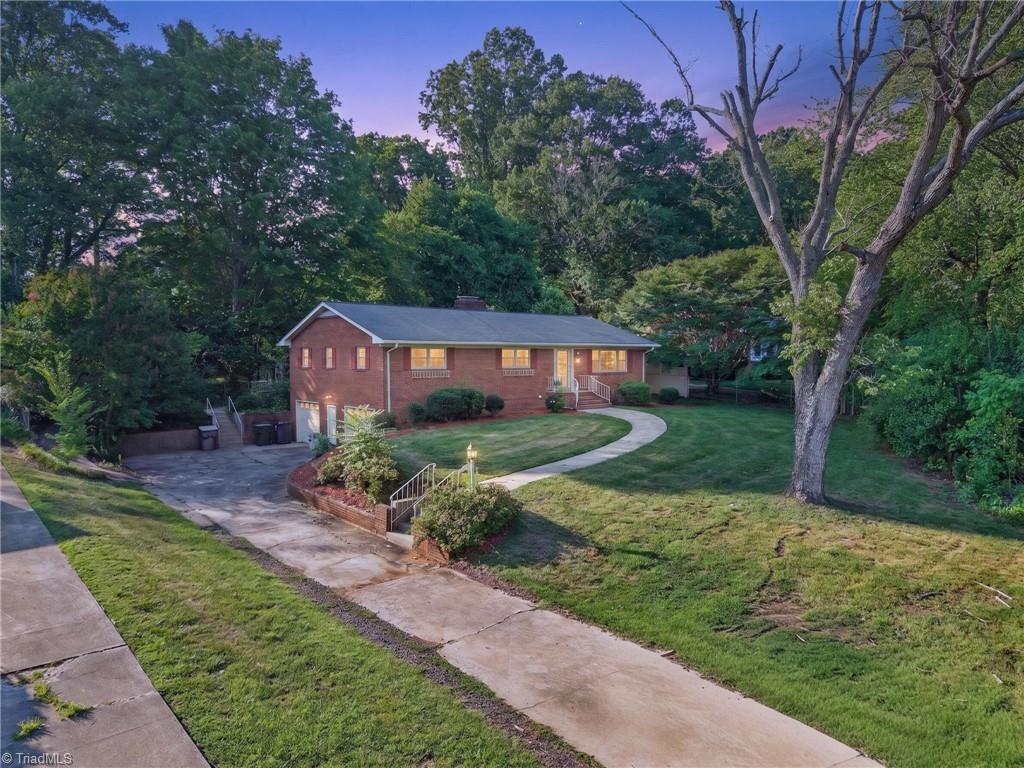 113 Green Valley Road Greensboro, NC 27403 - Photo 22 of 46 With over 2,300 square feet of living space, there's room here for entertaining, relaxing, working from home, and making memories.
