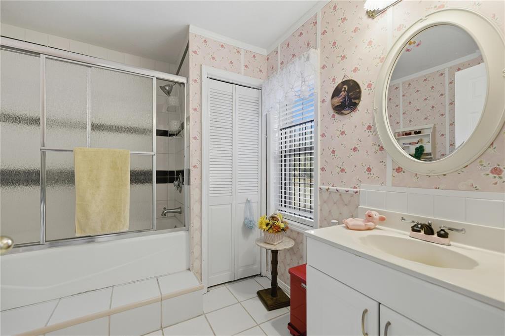 9151 Southwest 157th Lane Dunnellon, FL 34432 - Photo 15 of 63 a bathroom with a sink and a mirror