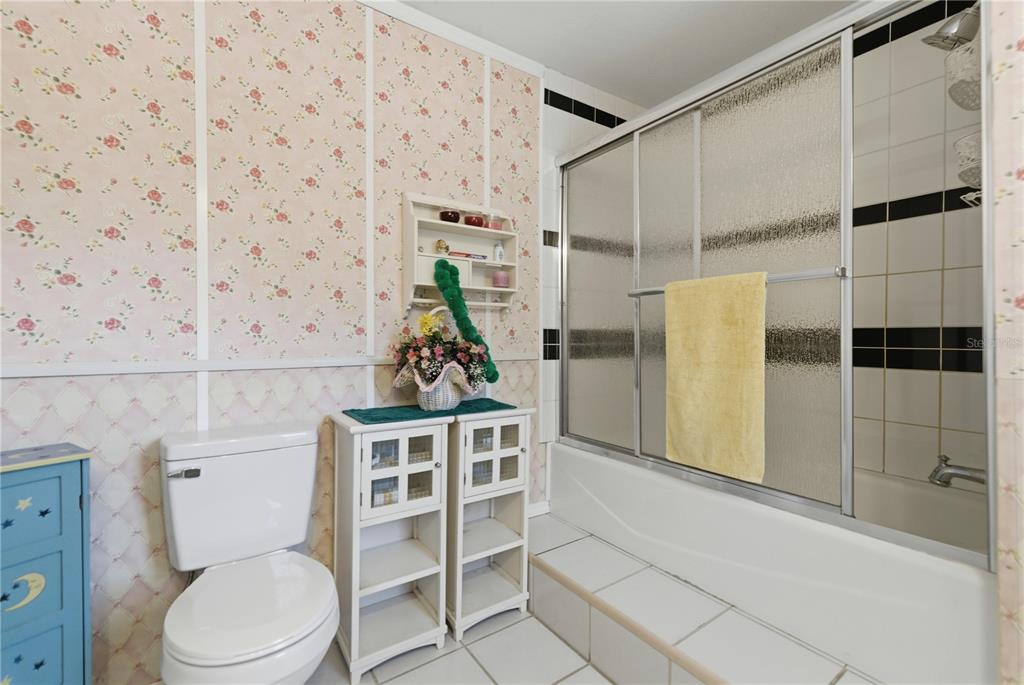 9151 Southwest 157th Lane Dunnellon, FL 34432 - Photo 16 of 63 a bathroom with a toilet and a shower