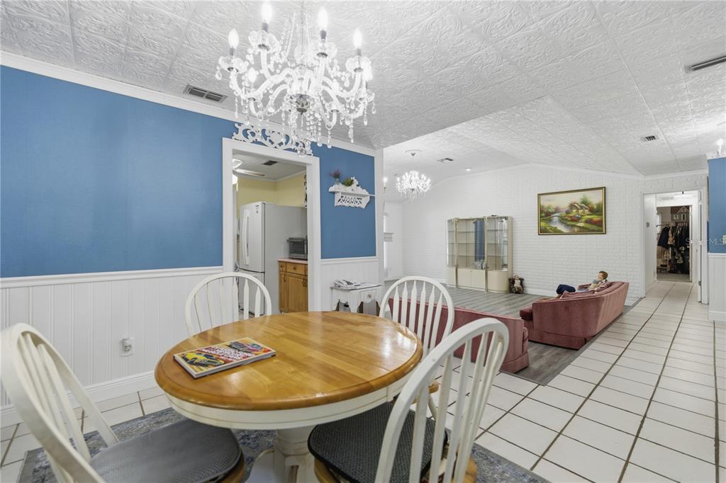 9151 Southwest 157th Lane Dunnellon, FL 34432 - Photo 20 of 63 a view of a dining room with furniture