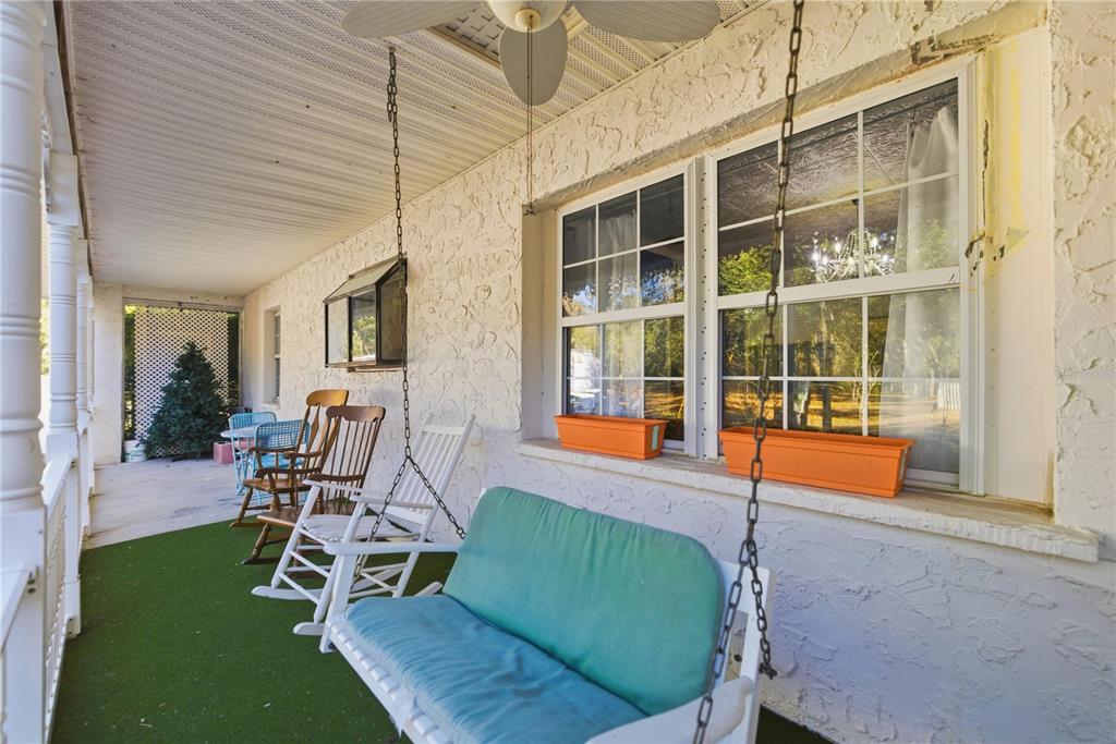 9151 Southwest 157th Lane Dunnellon, FL 34432 - Photo 29 of 63 a house view with a seating space and garden space