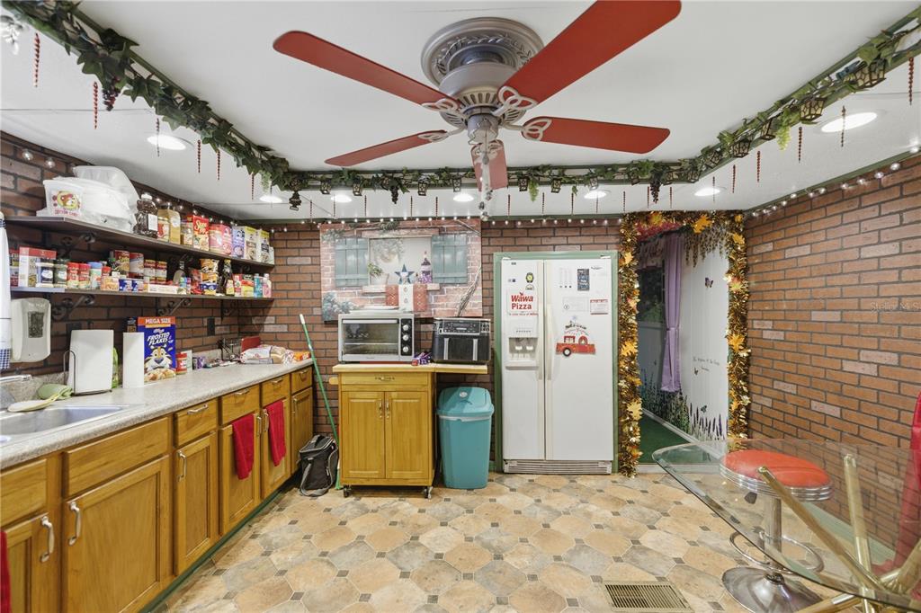 9151 Southwest 157th Lane Dunnellon, FL 34432 - Photo 46 of 63 a kitchen with stainless steel appliances granite countertop a sink and cabinets