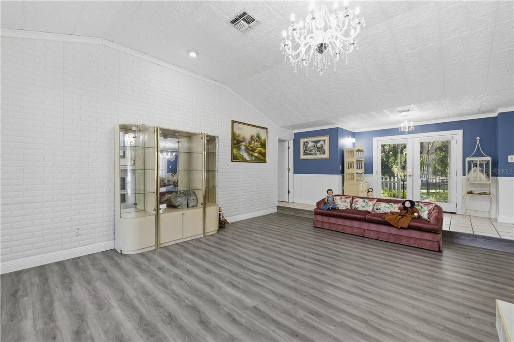 9151 Southwest 157th Lane Dunnellon, FL 34432 - Photo 5 of 63 a living room with furniture and wooden floor