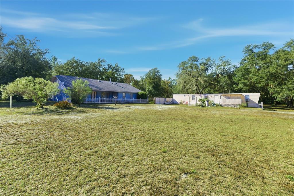 9151 Southwest 157th Lane Dunnellon, FL 34432 - Photo 63 of 63 a view of a field with an outdoor space