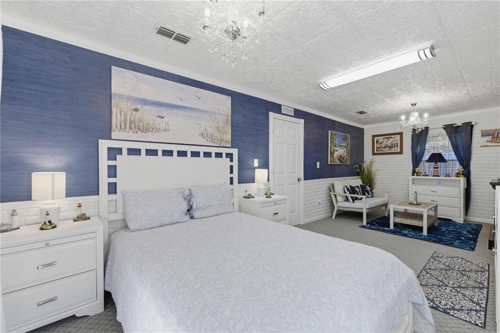 9151 Southwest 157th Lane Dunnellon, FL 34432 - Photo 9 of 63 a bedroom with a bed and window