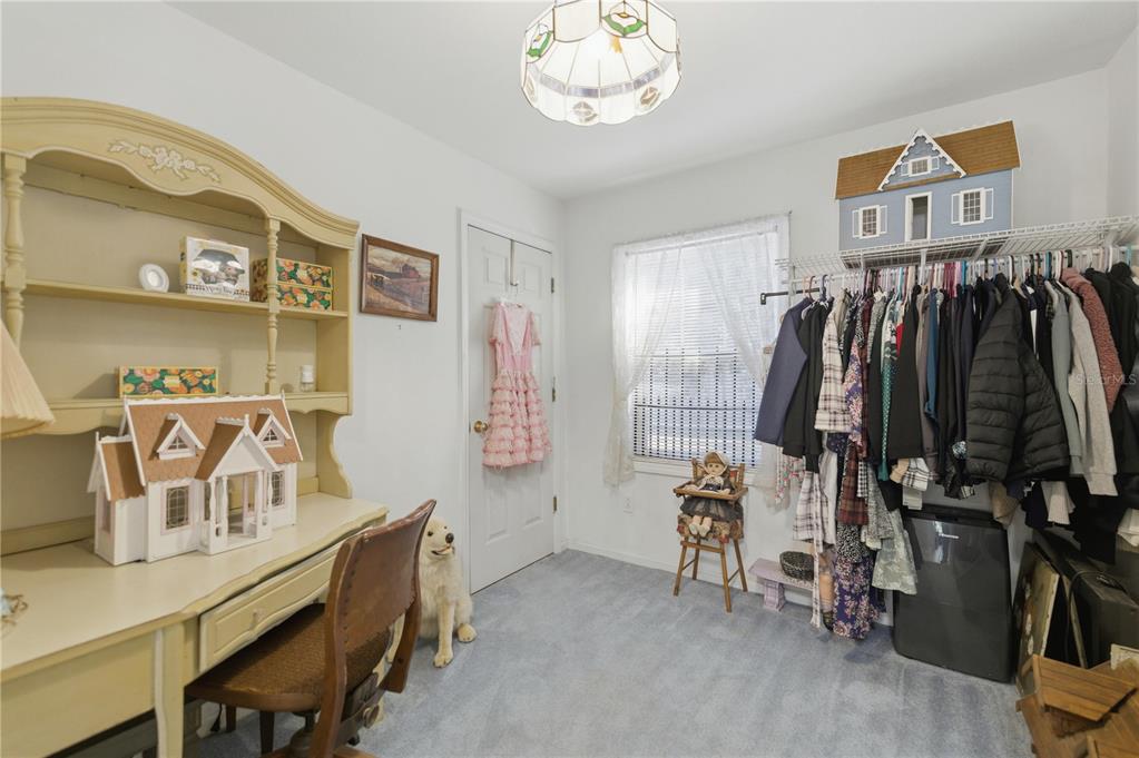 9151 Southwest 157th Lane Dunnellon, FL 34432 - Photo 10 of 63 a view of walk in closet with clothes and shoes