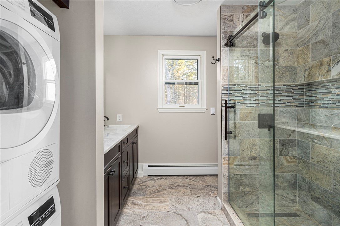 119 Locust Valley Road Exeter, RI 02822 - Photo 25 of 50 Master Bath recently renovated. Radiant floor heat. Bosch Stackable Washer/Dryer