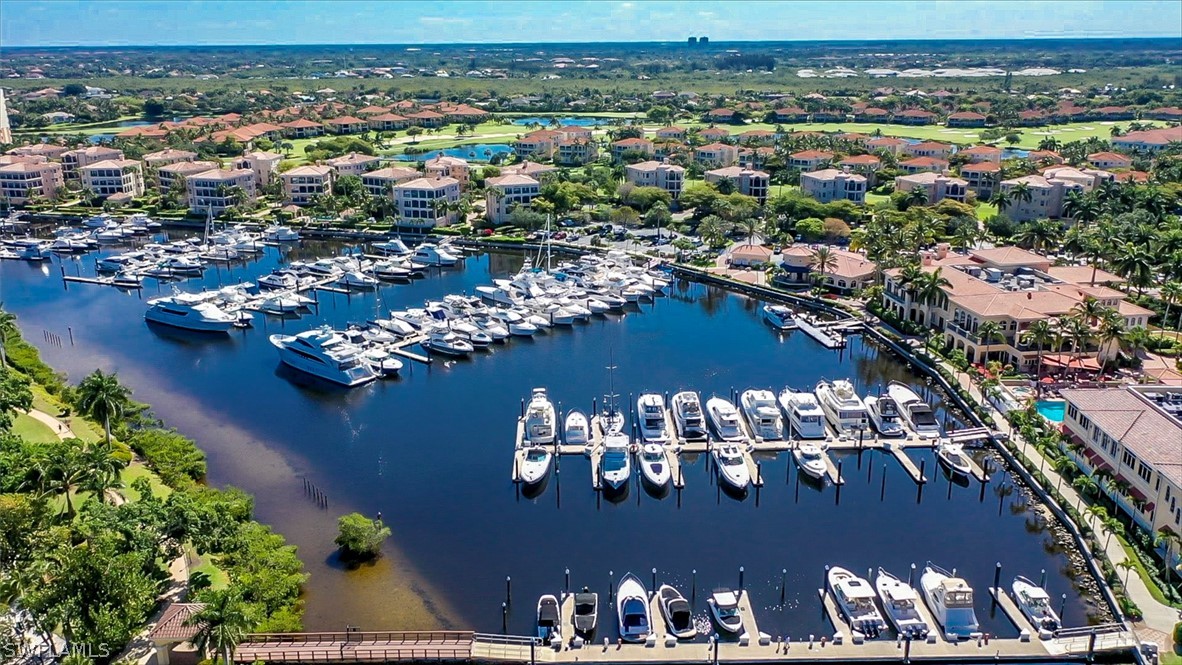 14979 Rivers Edge Court, Unit 223 Fort Myers, FL 33908 - Photo 20 of 21 an aerial view of a house with lots of residential buildings ocean and mountain view in back