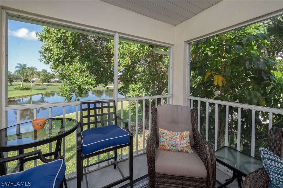 14979 Rivers Edge Court, Unit 223 Fort Myers, FL 33908 - Photo 5 of 21 a view of a chairs and table in the balcony