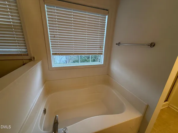 a bathroom with a bathtub