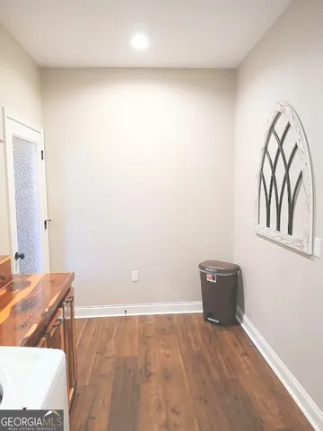 a stove top oven sitting inside of a kitchen