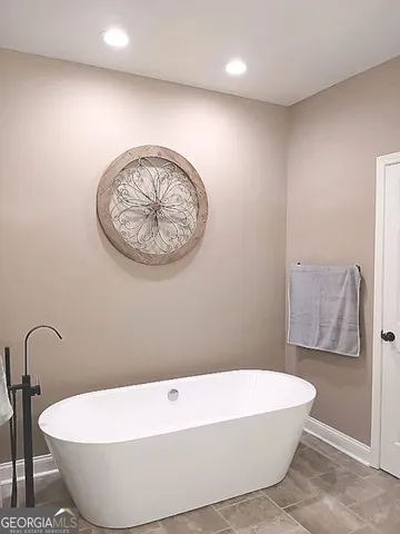 a bathroom with a sink double vanity and a mirror