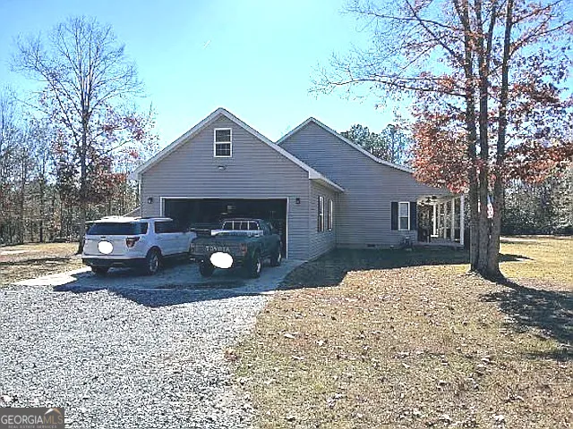 a front view of house with yard