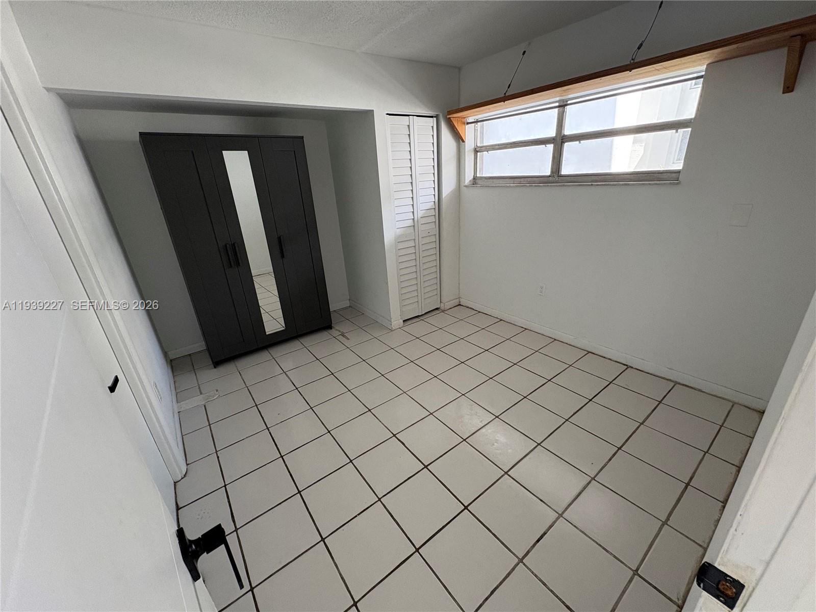 1331 Lincoln Road, Unit 402 Miami Beach, FL 33139 - Photo 15 of 20 a view of an empty room