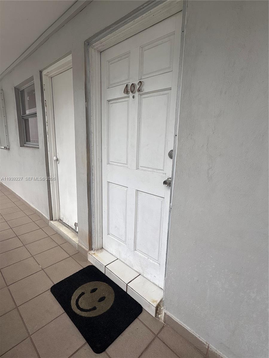 1331 Lincoln Road, Unit 402 Miami Beach, FL 33139 - Photo 4 of 20 a bathroom with a sink and vanity