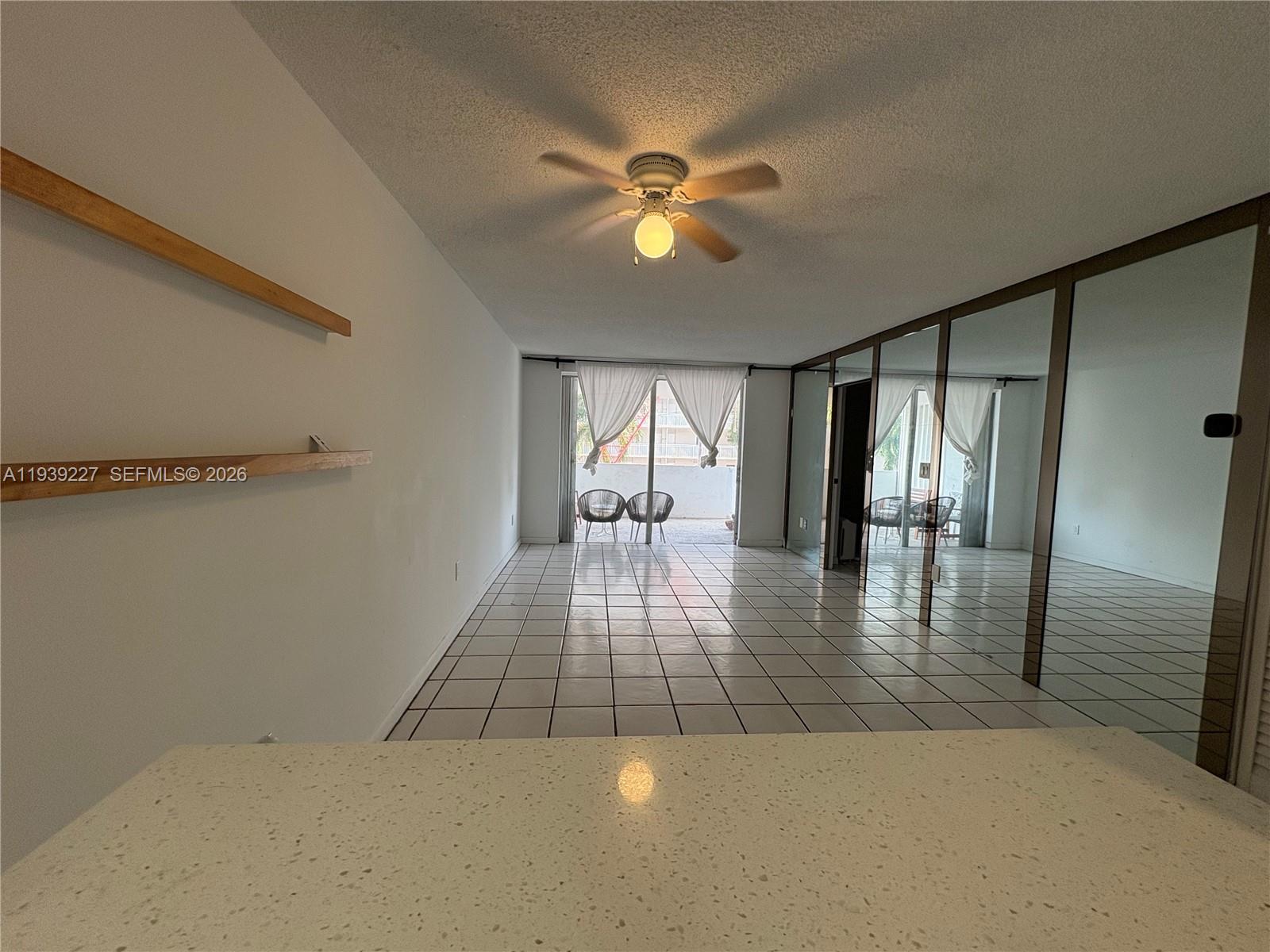 1331 Lincoln Road, Unit 402 Miami Beach, FL 33139 - Photo 9 of 20 a view of an entryway with wooden floor
