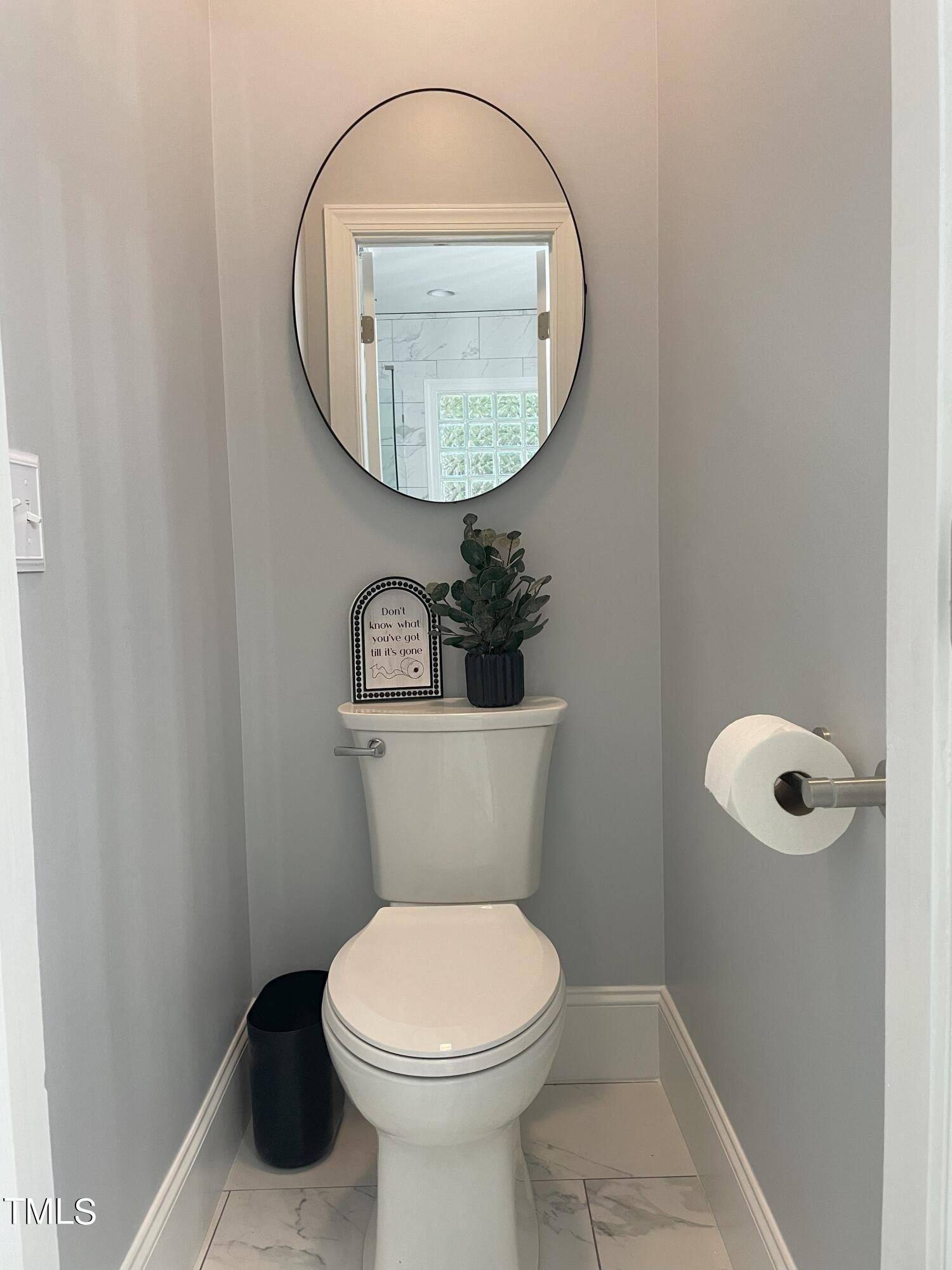3033 Pearces Road Zebulon, NC 27597 - Photo 19 of 42 22_Master Bathoom_water closet