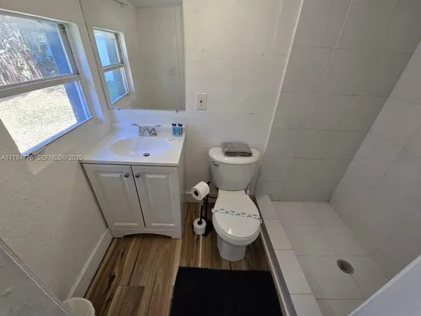 a bathroom with a sink and a toilet