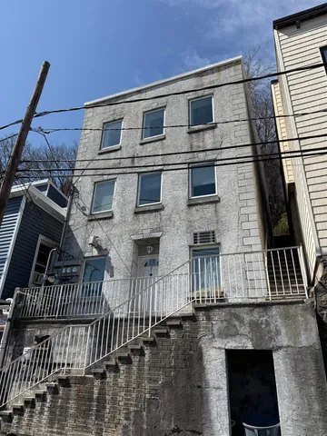 a front view of a house with a door