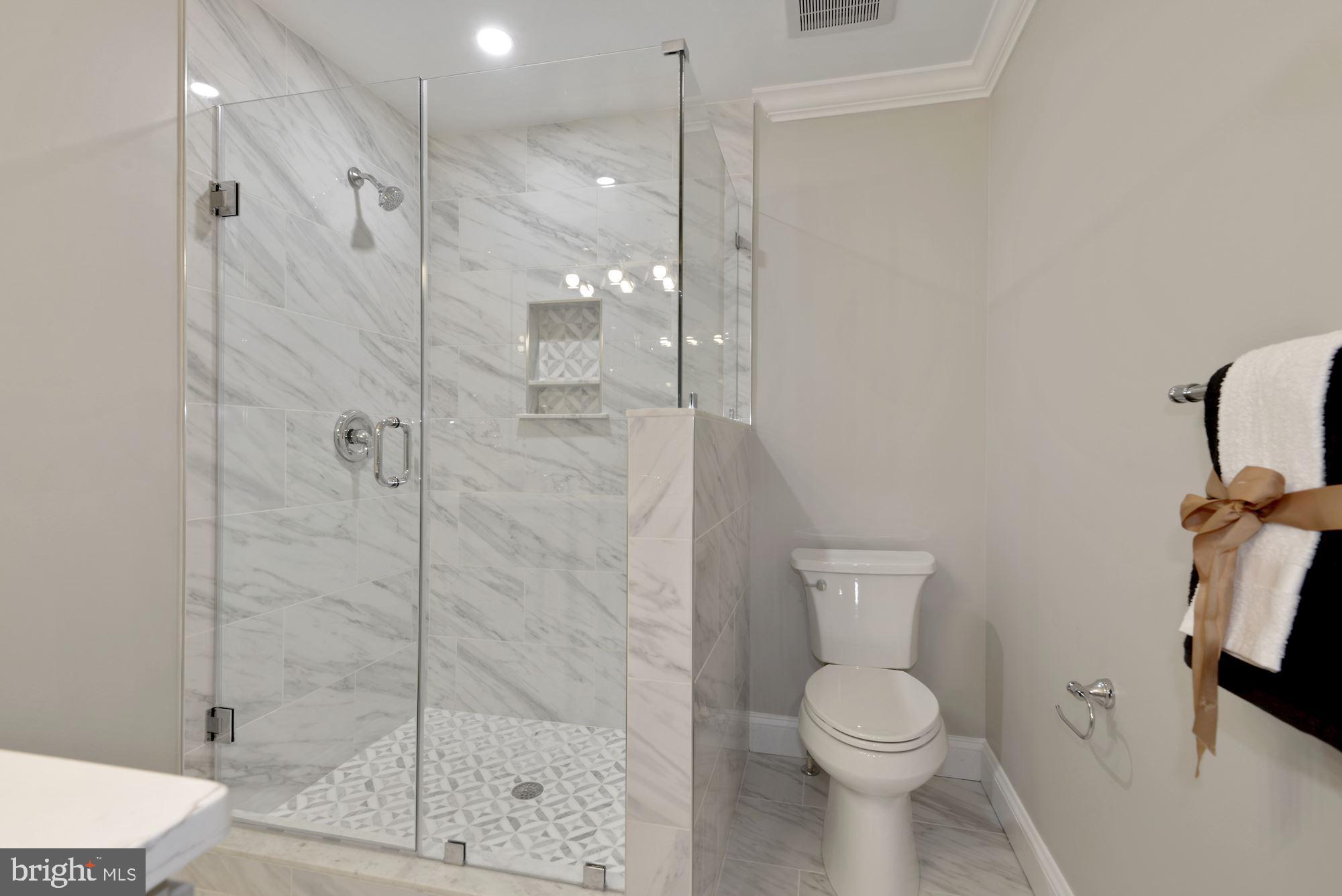 8007 Bainbridge Road Alexandria, VA 22308 - Photo 17 of 46 12 X 24 Carrara Marble Look Porcelain Floor/Wall