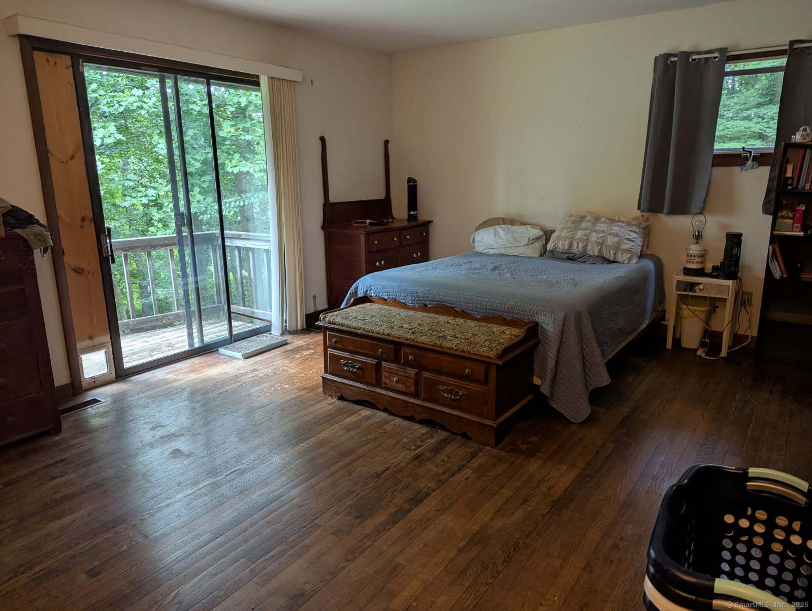 35 Sturbridge Road Easton, CT 06612 - Photo 18 of 23 a spacious bedroom with a bed and wooden floor