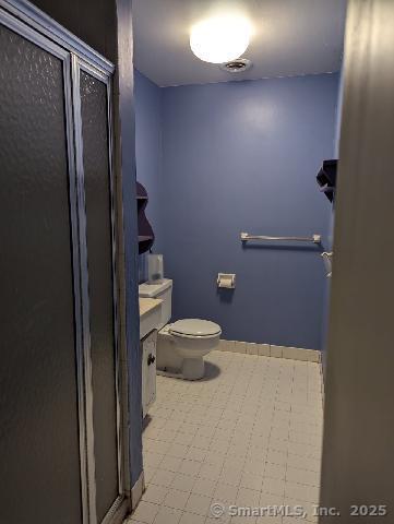 35 Sturbridge Road Easton, CT 06612 - Photo 21 of 23 a bathroom with a granite countertop shower and a toilet