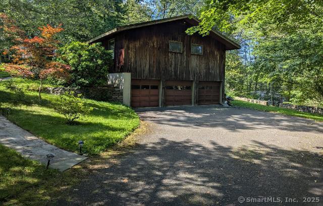 35 Sturbridge Road Easton, CT 06612 - Photo 3 of 23 a view of a house with a small yard