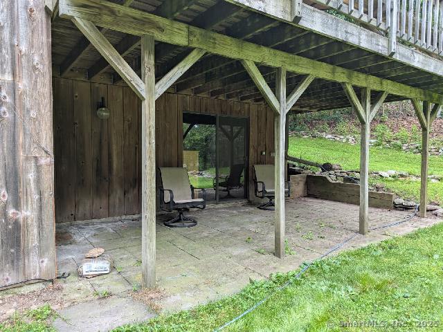 35 Sturbridge Road Easton, CT 06612 - Photo 7 of 23 a backyard of a house with table and chairs