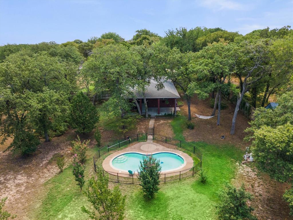 122 Brookshire Avenue Azle, TX 76020 - Photo 1 of 40 an aerial view of a house with a yard