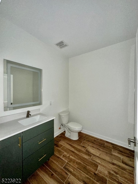 321 East 3rd Street, Unit 210 Plainfield, NJ 07060 - Photo 17 of 21 a bathroom with a sink and a mirror
