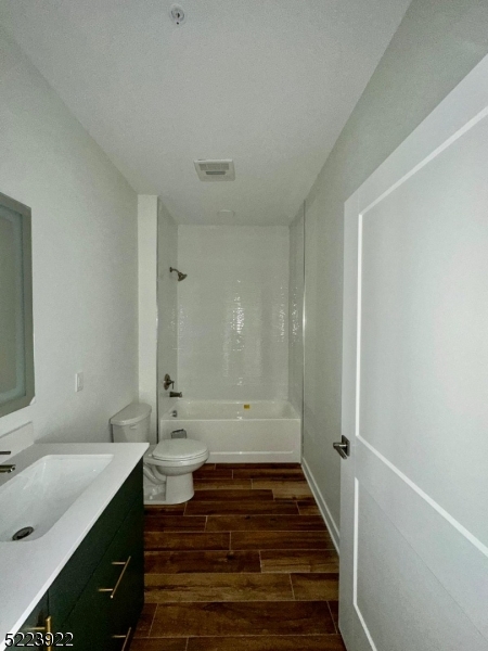 321 East 3rd Street, Unit 210 Plainfield, NJ 07060 - Photo 8 of 21 a bathroom with a sink and a mirror