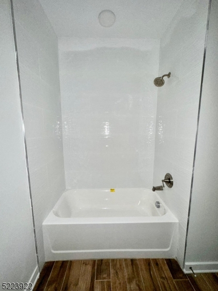 321 East 3rd Street, Unit 210 Plainfield, NJ 07060 - Photo 9 of 21 a bathroom with a bathtub and shower