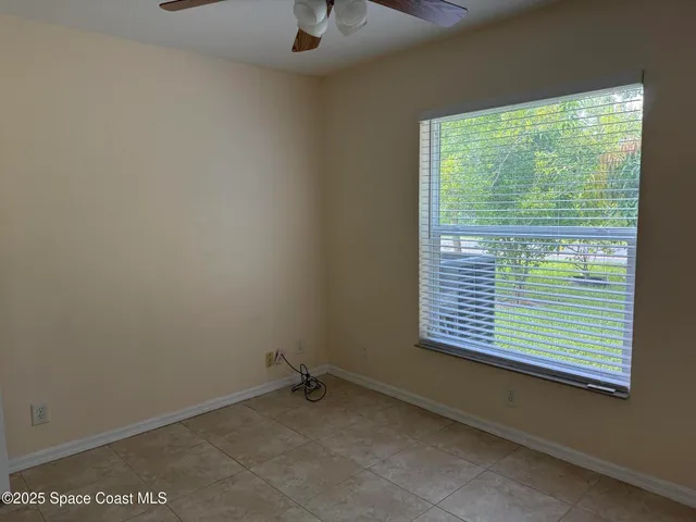 a view of a room that has a window in it