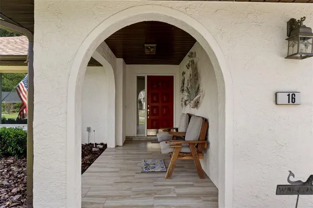 a view of living room with furniture and rug