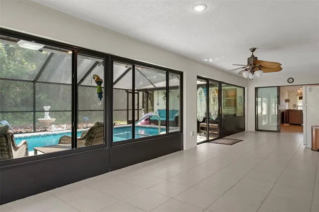 a living room with large windows