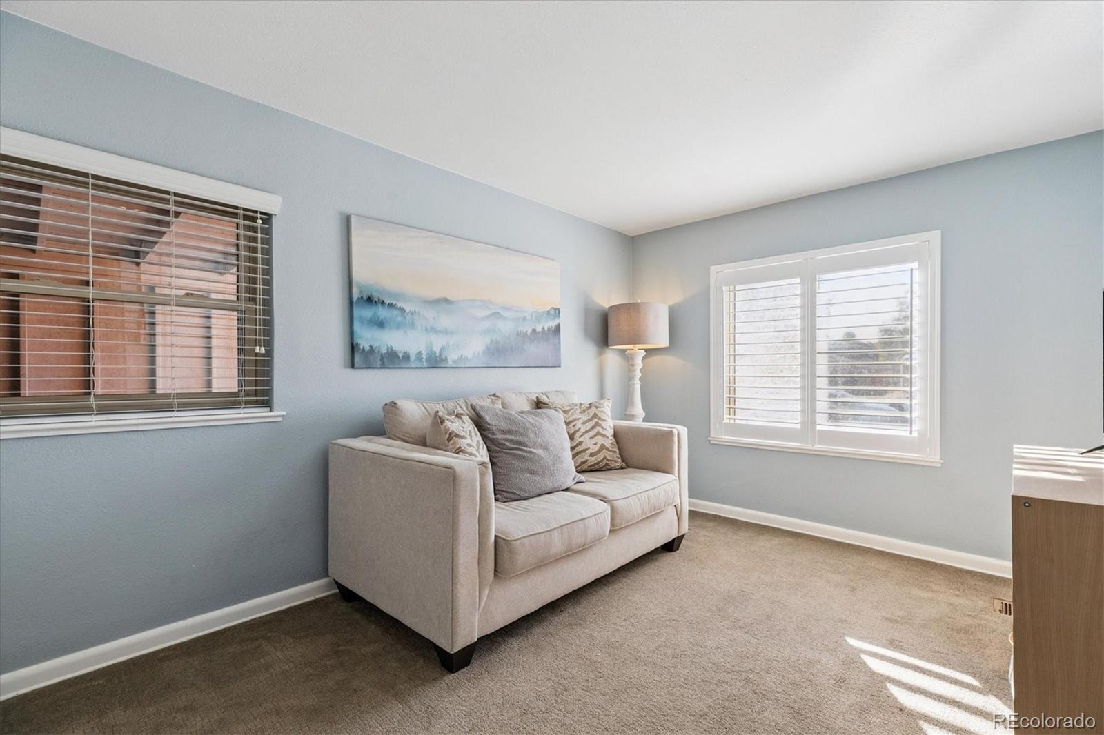 2660 Kearney Street Denver, CO 80207 - Photo 19 of 35 a living room with furniture and a window
