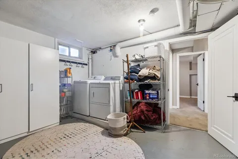 a bedroom with storage and utility