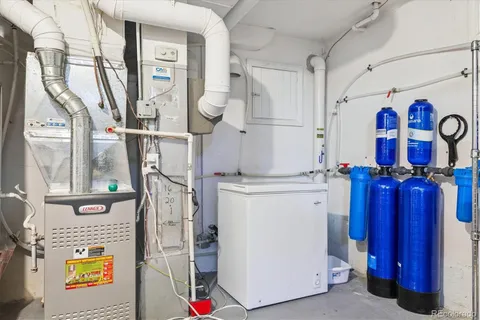 a view of storage and utility room with washer and dryer