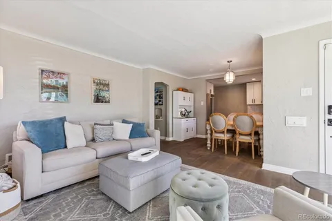 a living room with furniture and a table