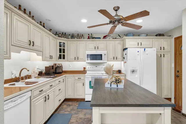 a room with furniture and pool table