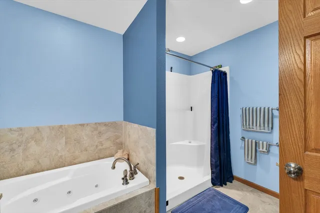 a view of a house with sitting area and garden