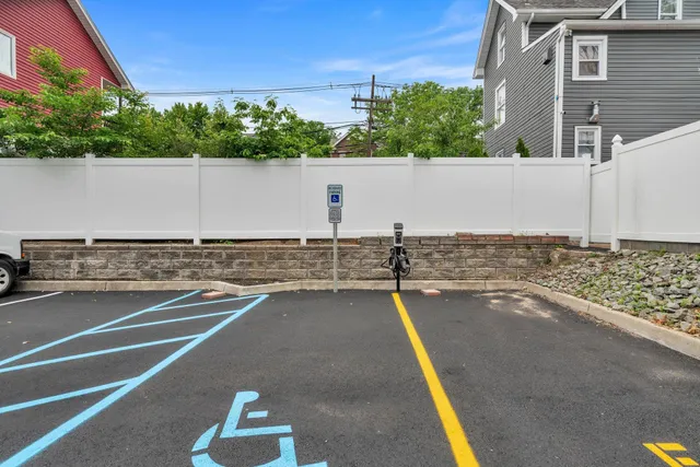 a view of a swimming pool with a yard