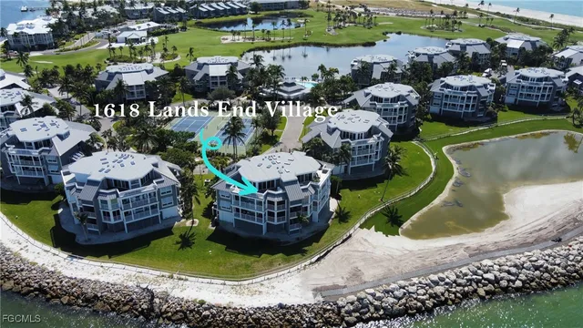 a view of swimming pool with outdoor seating and outdoor seating