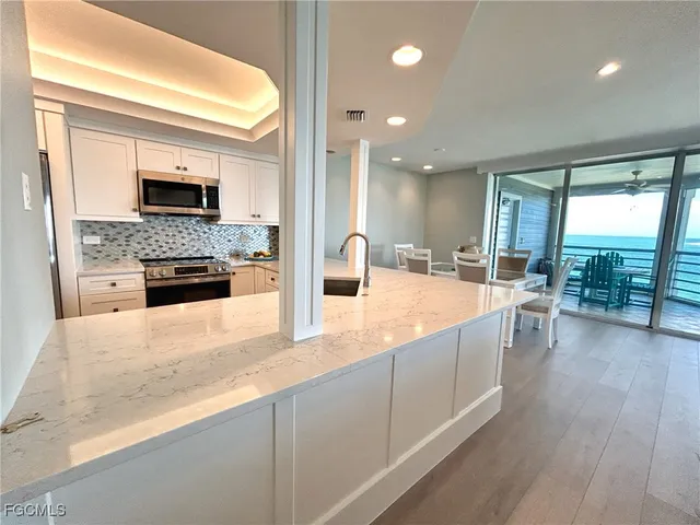 a view of a street with sitting area